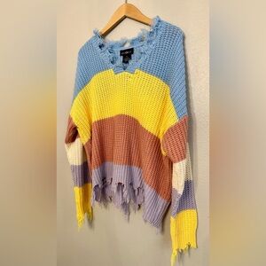 Colorful sweater with fringe